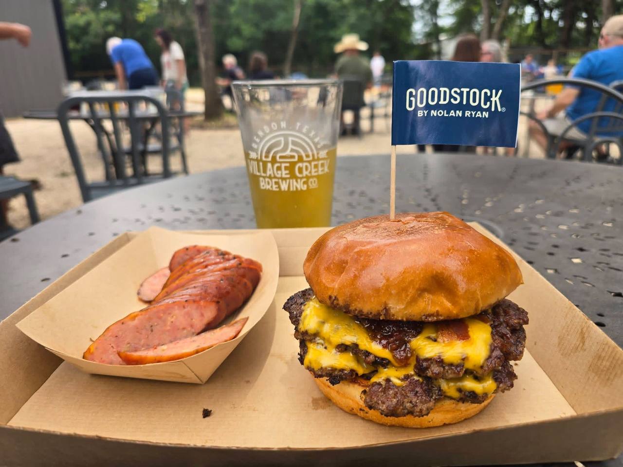 Smash burger and sausage at Village Creek Brewery